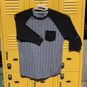 Baseball style 3/4 sleeve shirt.